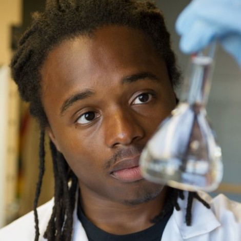 scientist holding a test tube