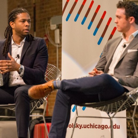 2 men discussing at a round table event