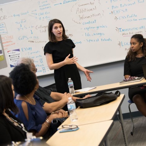 women presenting to her classmates